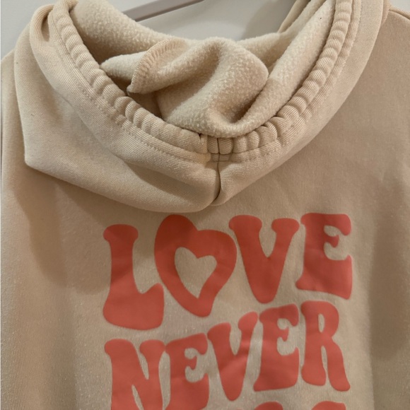 Shein Tan and Pink Love Never Fails Bible Verse Sweatshirt - Picture 5 of 7
